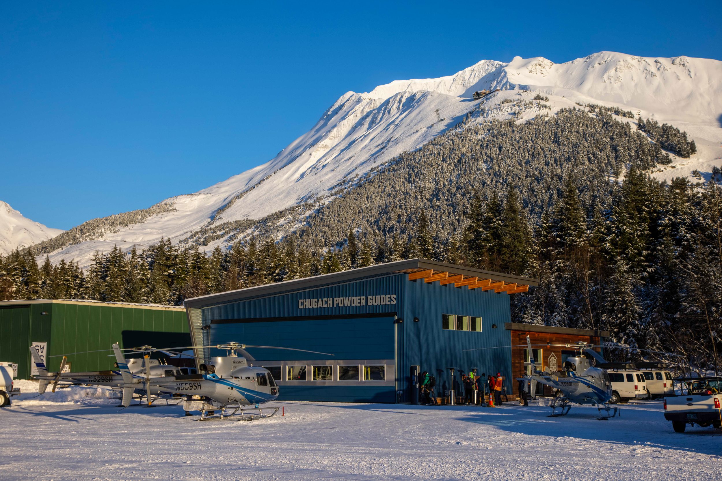 The Chugach Powder Guides hangar on a bluebird winter day