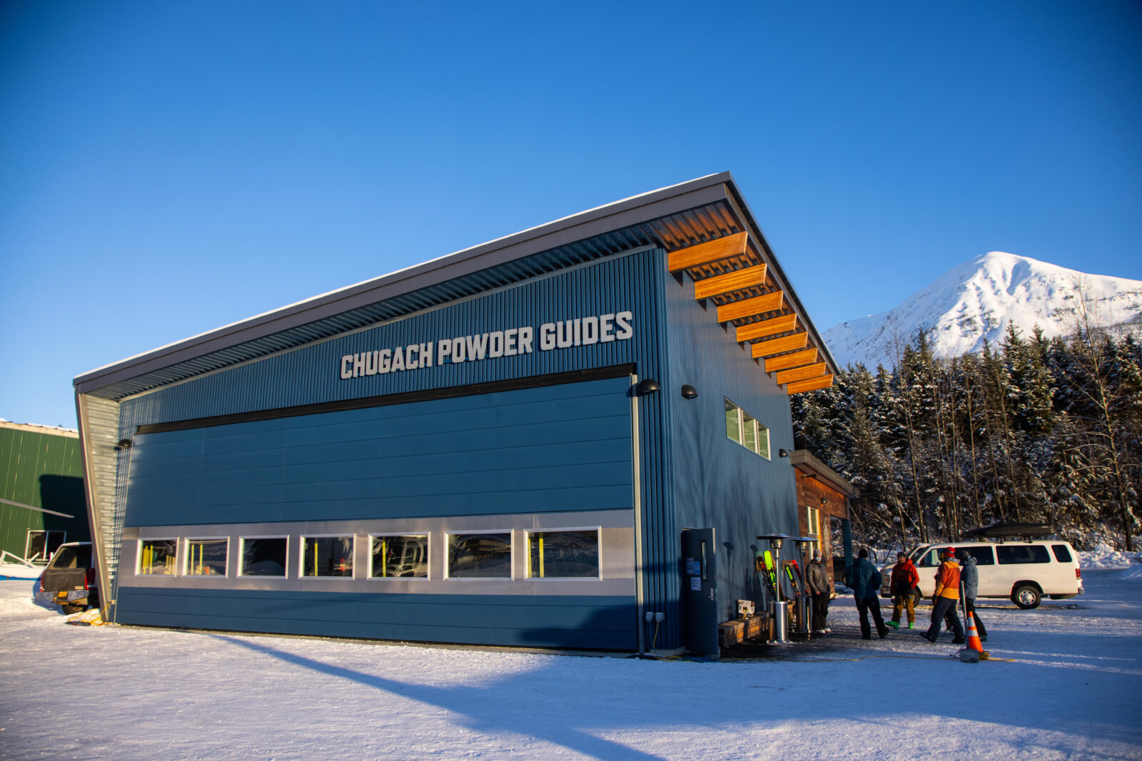 The Chugach Powder Guides hangar on a bluebird winter day.